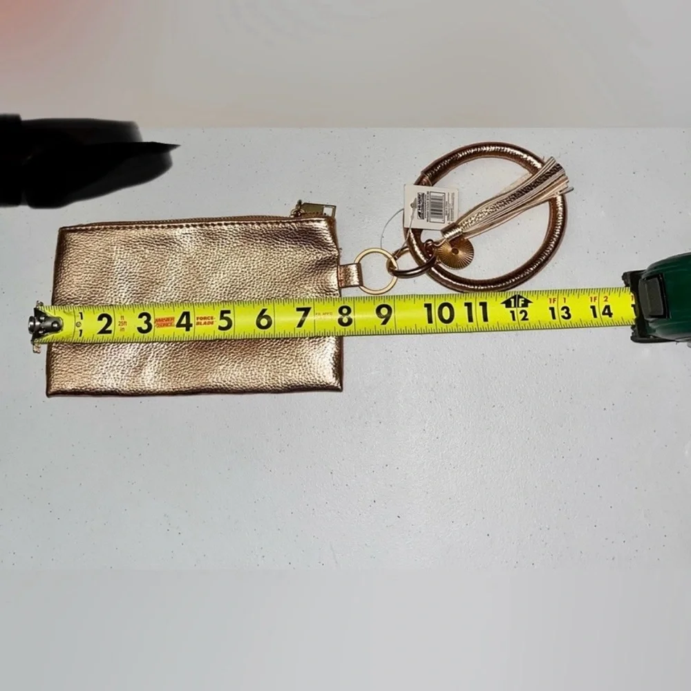 💙 NWT Pink Texture Wristlet with Tassel & Charm